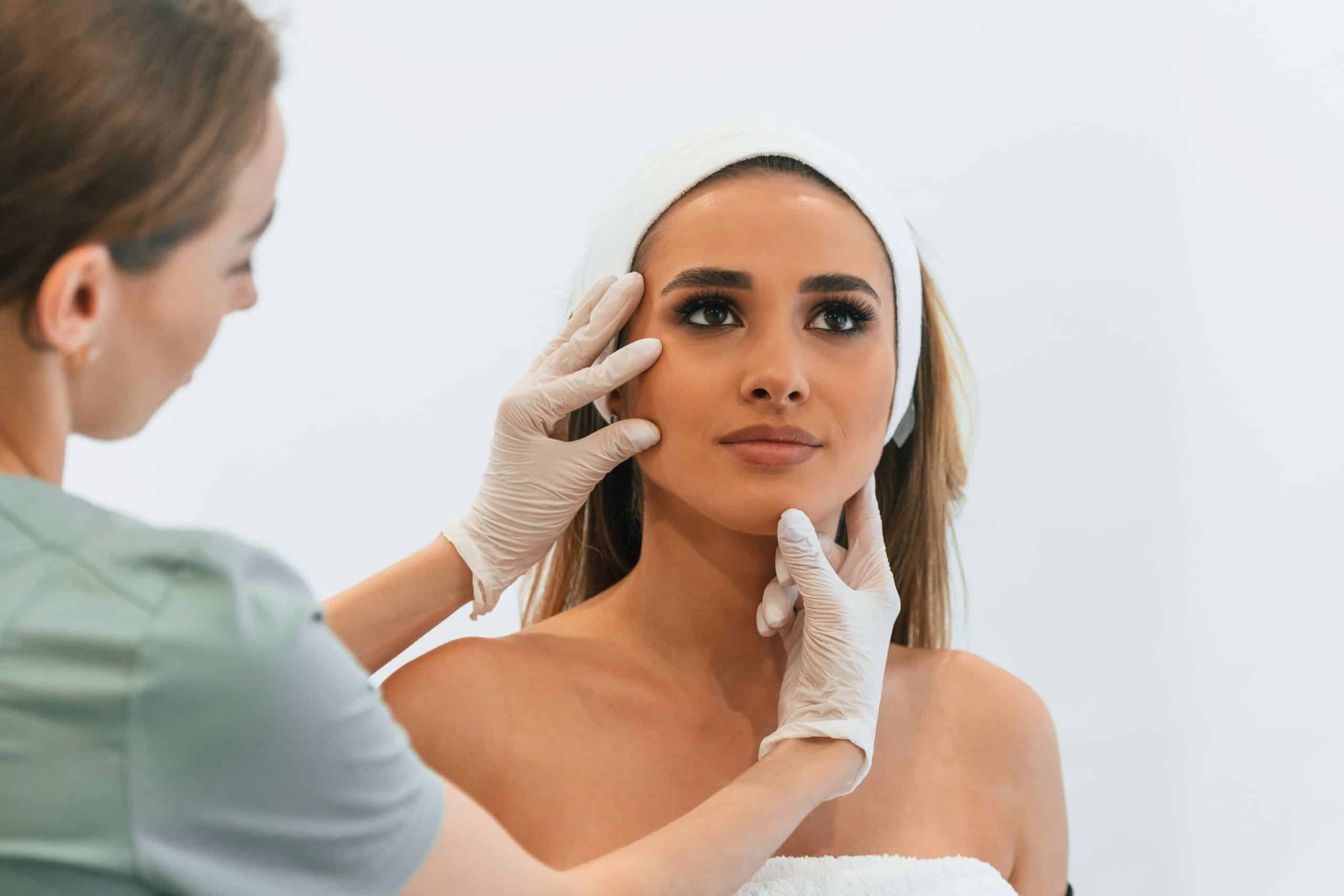 The woman is getting treatment from cosmetic dentistry for the halloween season