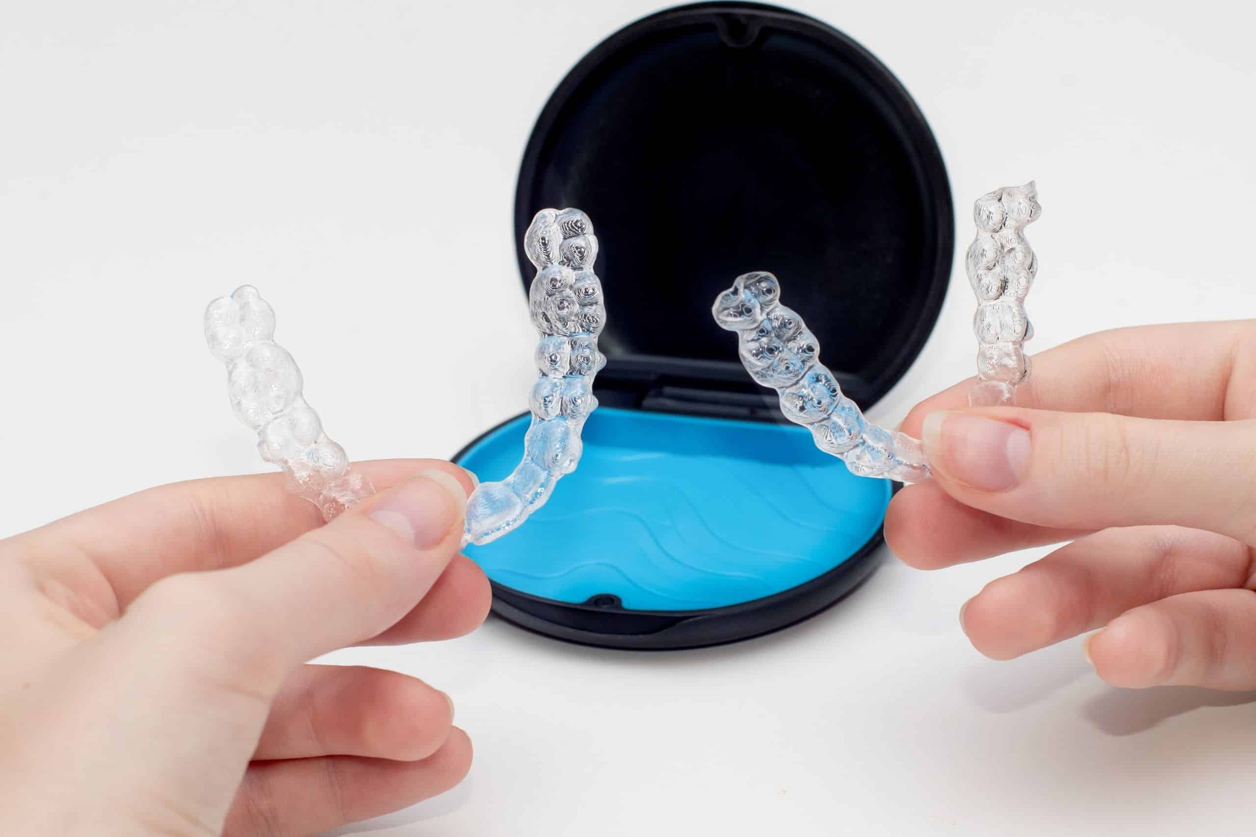 The person is in dilemma whether he/she can you drink coffee while wearing invisalign