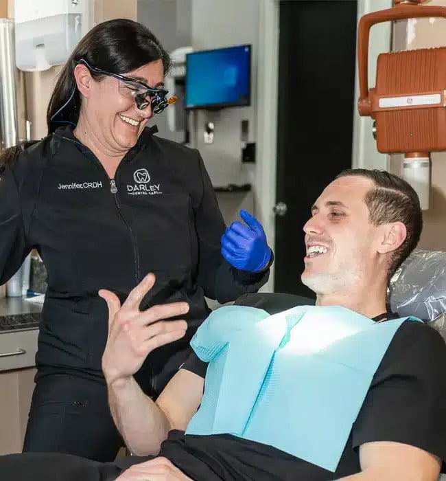 Dentist consulting for teeth whitening session with patient at Darley Dental Care