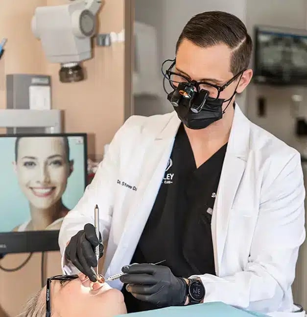General dentist checking the dental patient at Darley Dental Care in Altamonte Springs