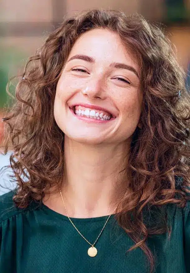 Smiling woman after dental veneers at Darley Dental Care of Altamonte Springs